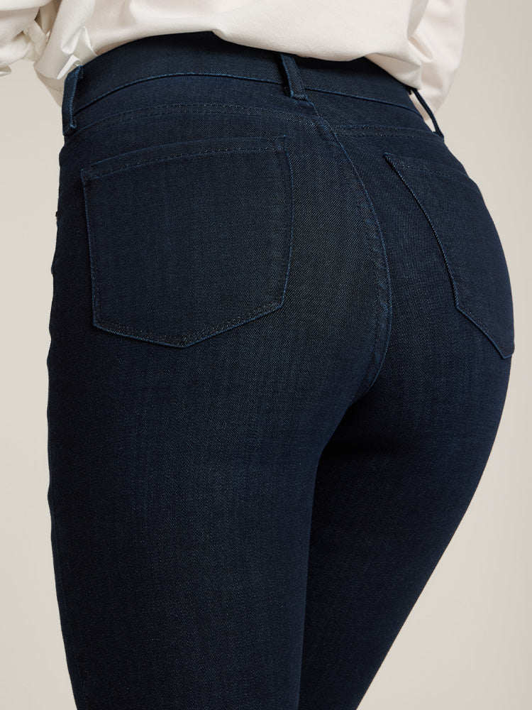 Women wearing Medium/Dark Blue High Rise Miniboot Ankle Jane Jeans