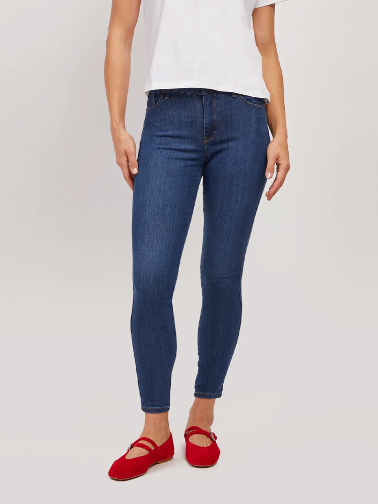 Women wearing Medium Blue High Rise Skinny Jane Jeans