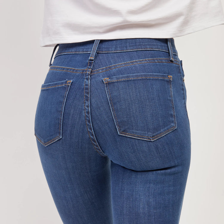 Women wearing Medium Blue High Rise Skinny Jane Jeans