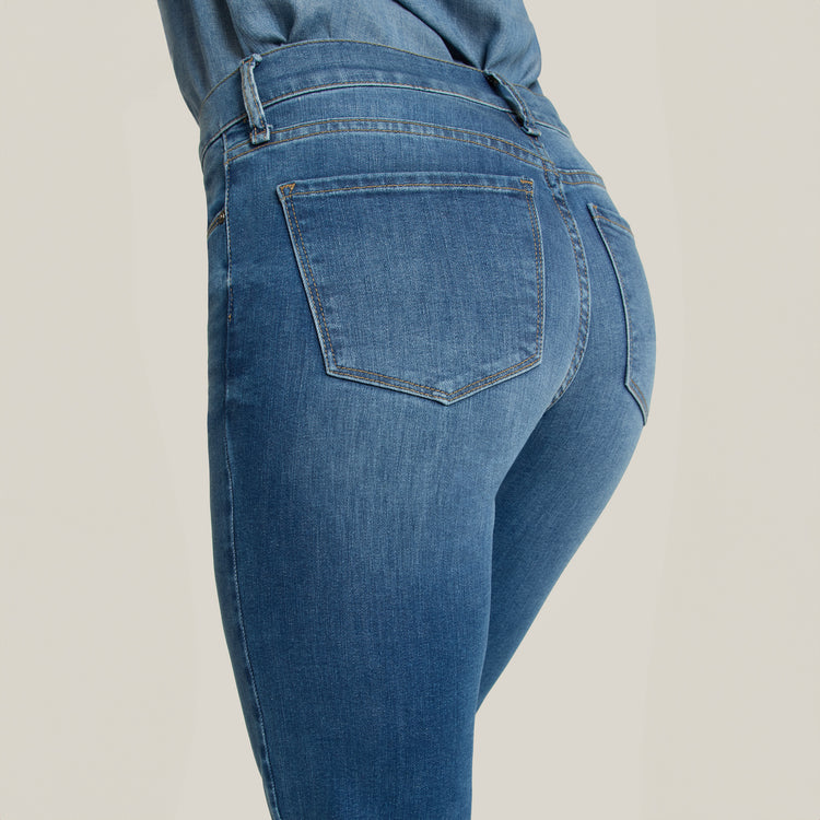 Women wearing Medium Blue Mid Rise Slim Cropped Leg Logan Jeans