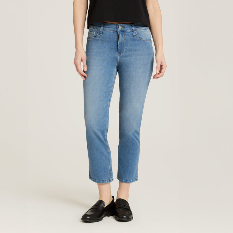 Women wearing Light Blue Mid Rise Slim Cropped Leg Logan Jeans
