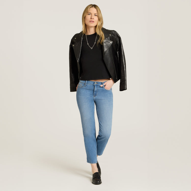 Women wearing Light Blue Mid Rise Slim Cropped Leg Logan Jeans