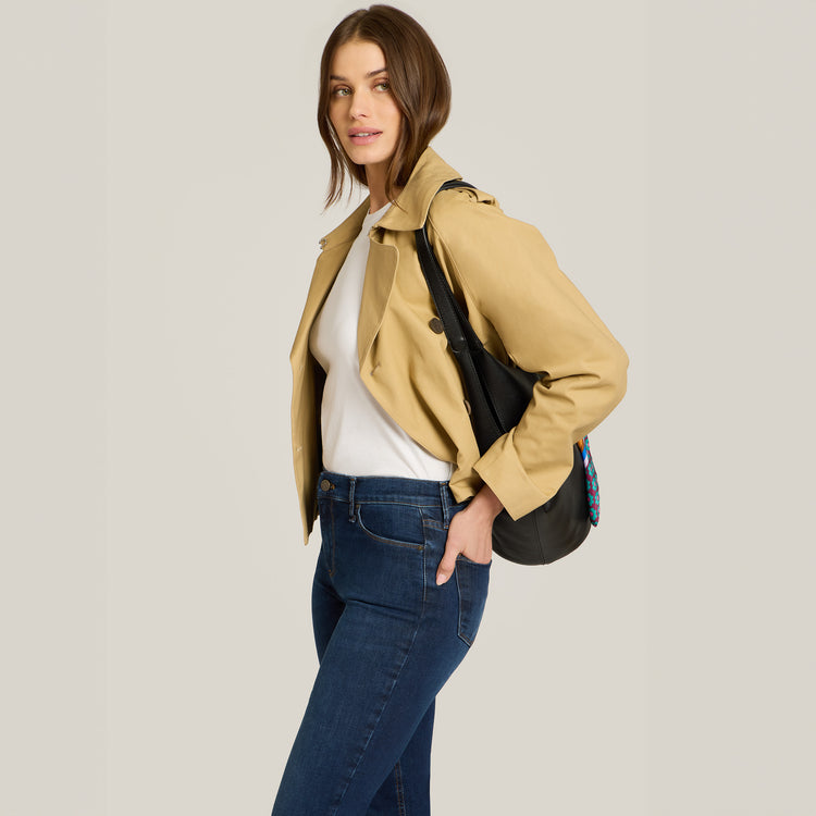 Women wearing Dark Blue Mid Rise Slim Cropped Leg Logan Jeans