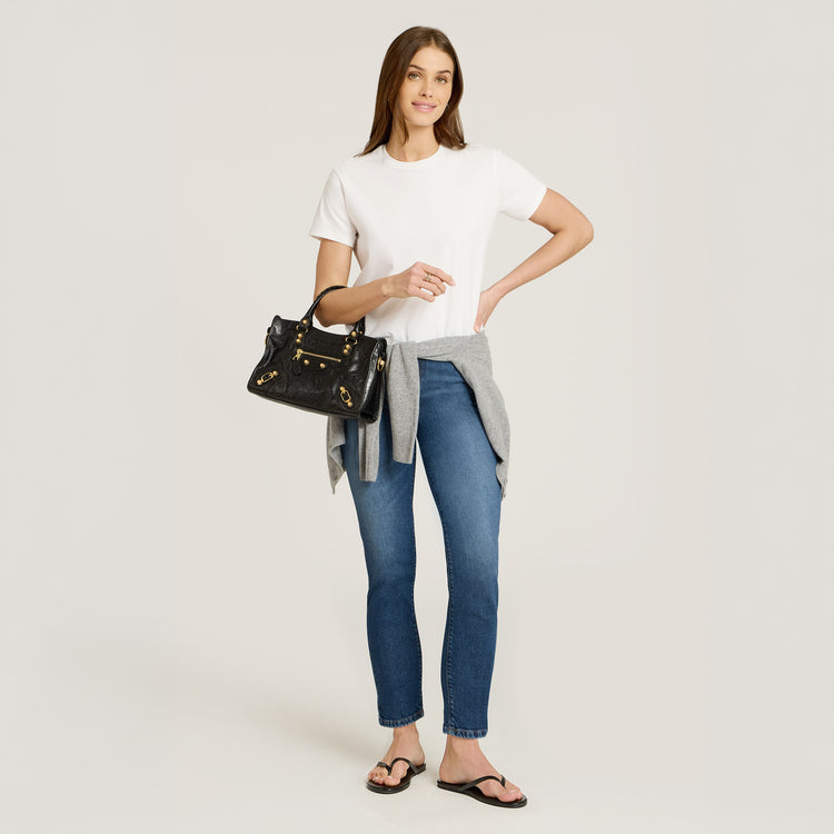 Women wearing Medium Blue High Rise Mom Ridge Jeans