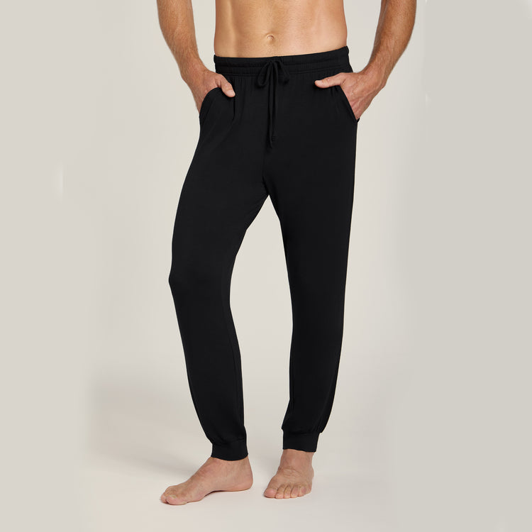 Men wearing Black Unisex Pajama Pants