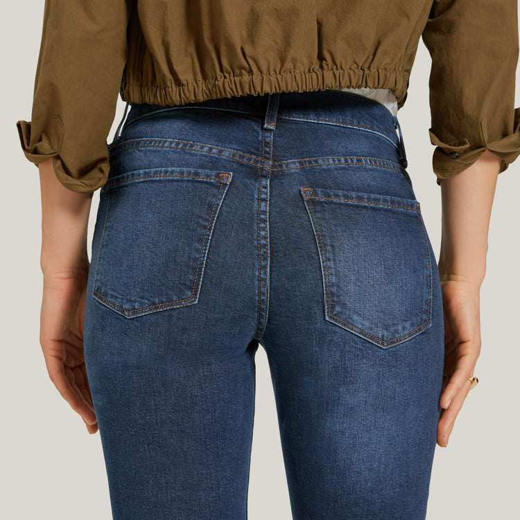 Women wearing Medium/Dark Blue Mid Rise Slim Straight Ridge Jeans