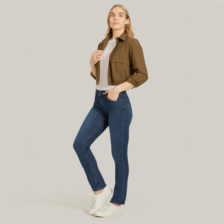 Women wearing Medium/Dark Blue Mid Rise Slim Straight Ridge Jeans