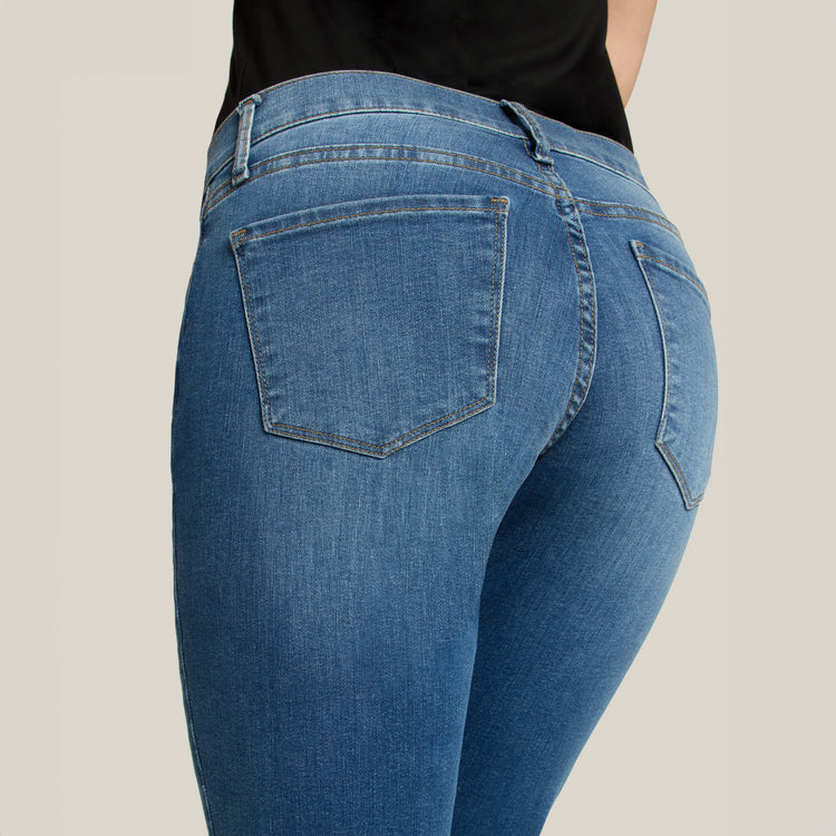 Women wearing Medium Blue Mid Rise Slim Straight Logan Jeans