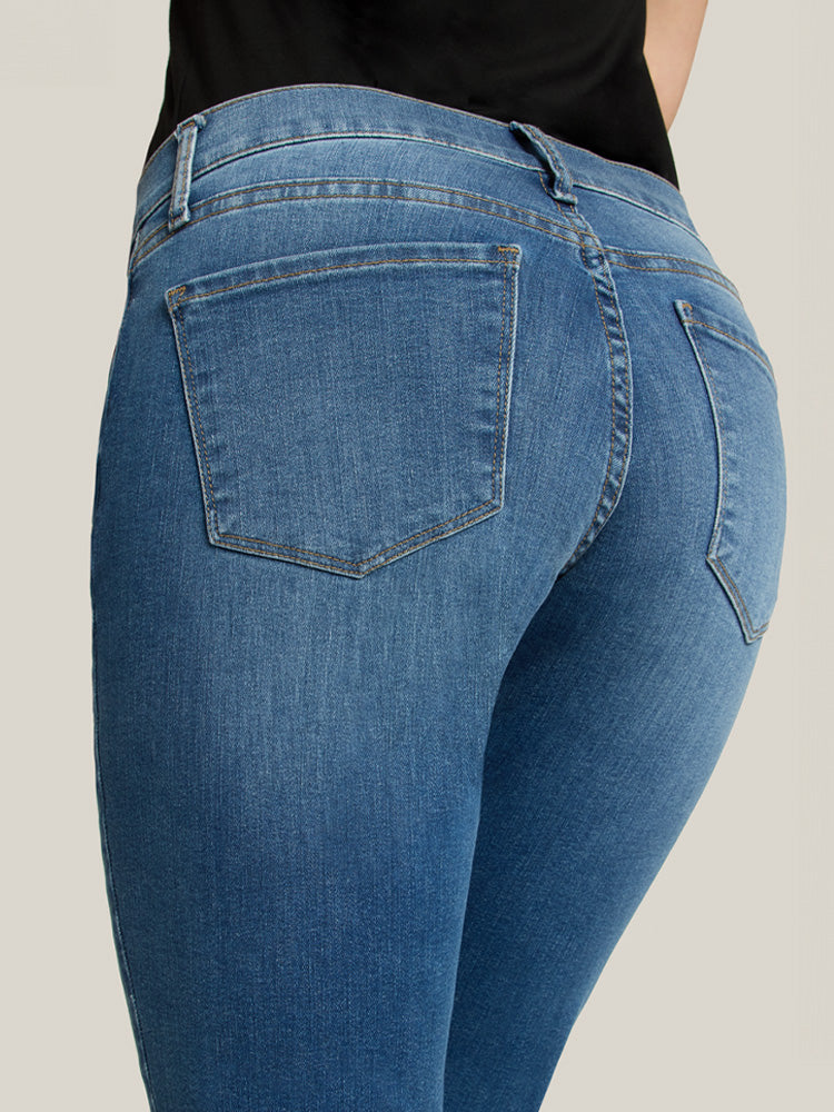 Women wearing Medium Blue Mid Rise Slim Straight Logan Jeans