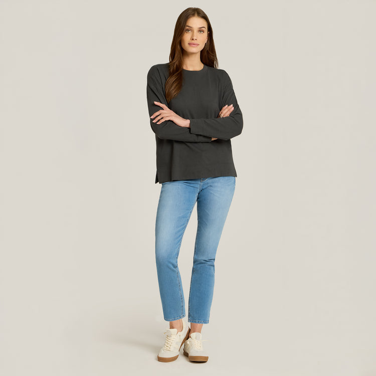 Women wearing Light Blue Mid Rise Slim Straight Logan Jeans