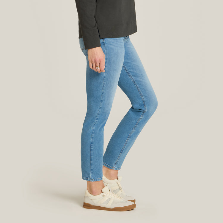 Women wearing Light Blue Mid Rise Slim Straight Logan Jeans