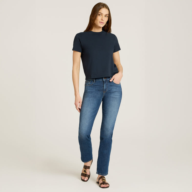 Women wearing Medium Blue Mid Rise Slim Straight Ridge Jeans