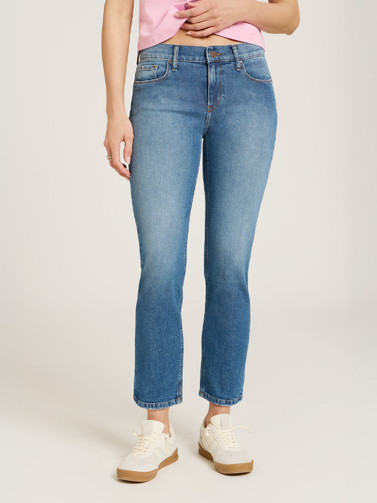 Women wearing Light Blue Mid Rise Slim Straight Ridge Jeans