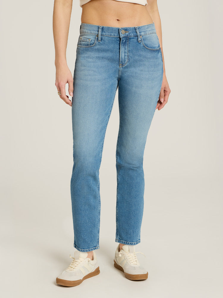 Women wearing Washed Out Blue Mid Rise Slim Straight Ridge Jeans