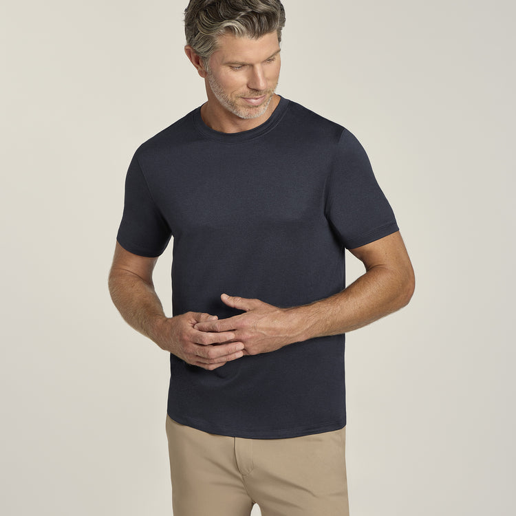 Men wearing Navy Heather Tech Tee