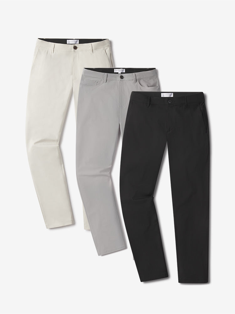 Men wearing Stone/Silver/Black 5 Pocket Travel Pants 3-Pack pants