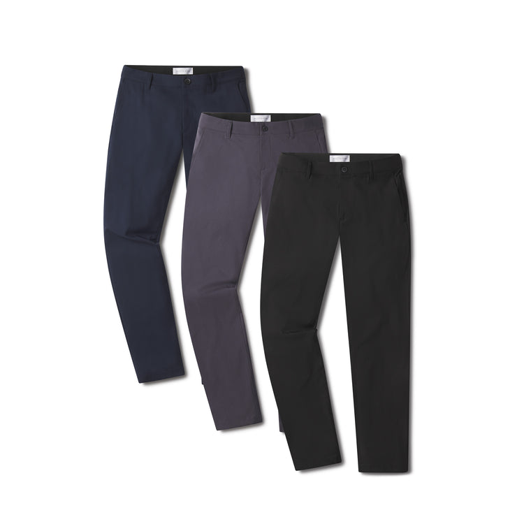 Men wearing Granite/Navy/Black 5 Pocket Travel Pants 3-Pack