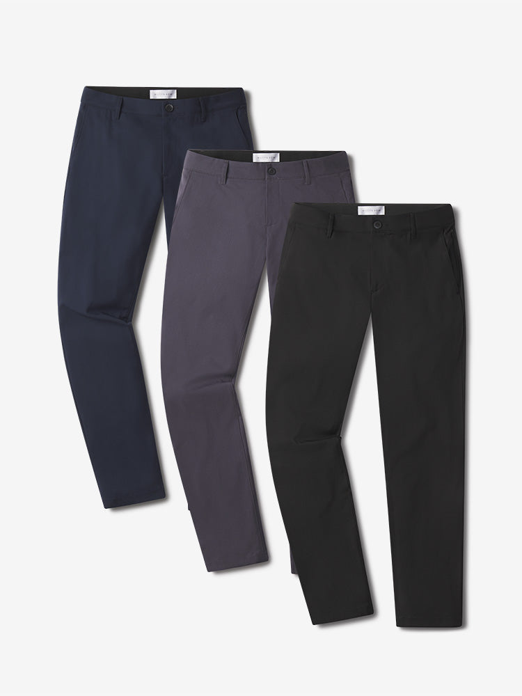 Men wearing Granite/Navy/Black 5 Pocket Travel Pants 3-Pack
