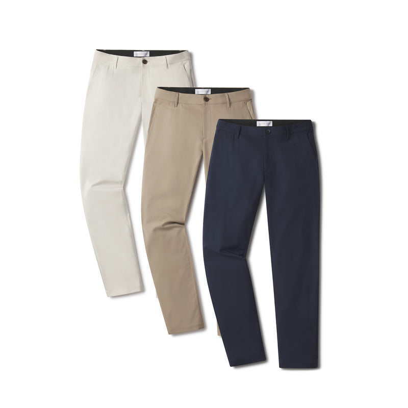 Men wearing Navy/Stone/Khaki 5 Pocket Travel Pants 3-Pack pants