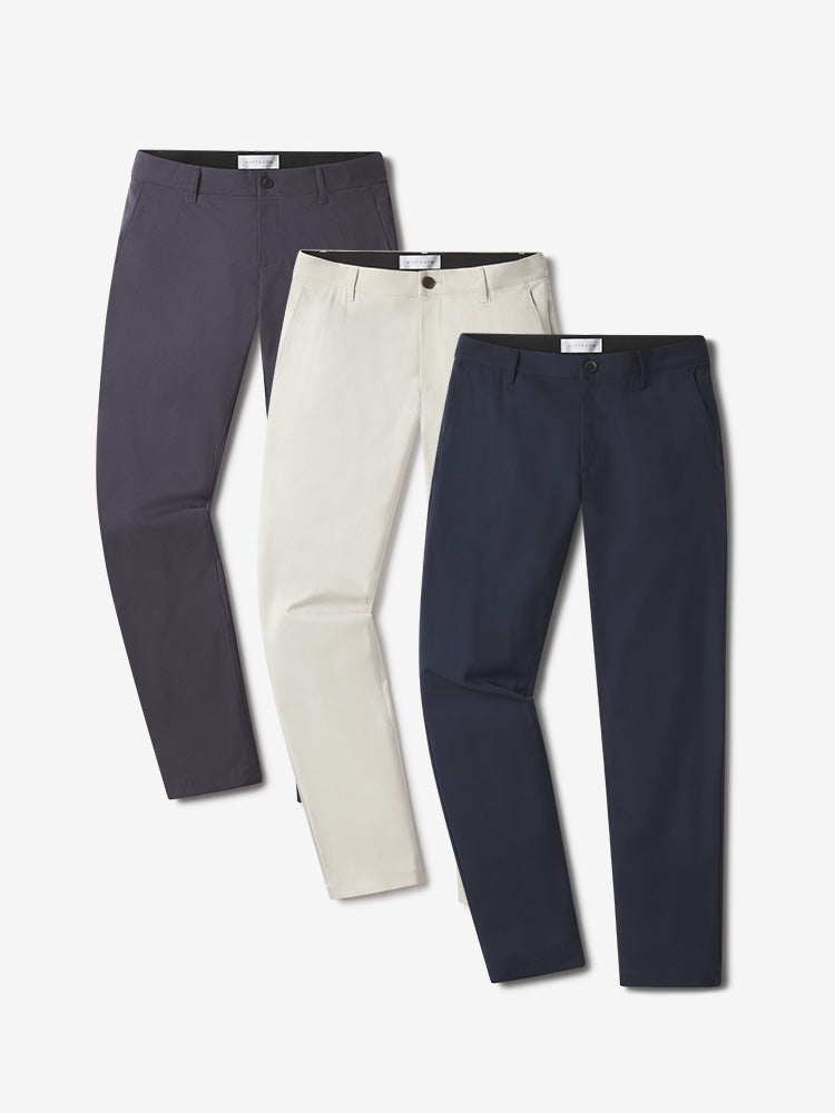Men wearing Stone/Navy/Granite 5 Pocket Travel Pants 3-Pack