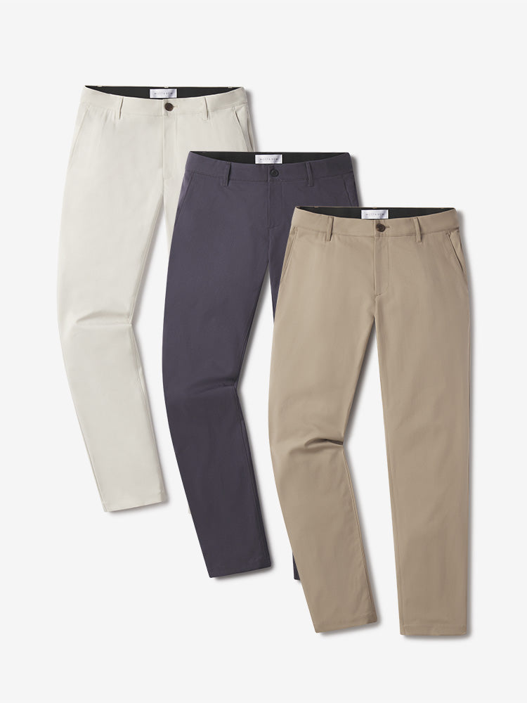 Men wearing Stone/Granite/Khaki 5 Pocket Travel Pants 3-Pack