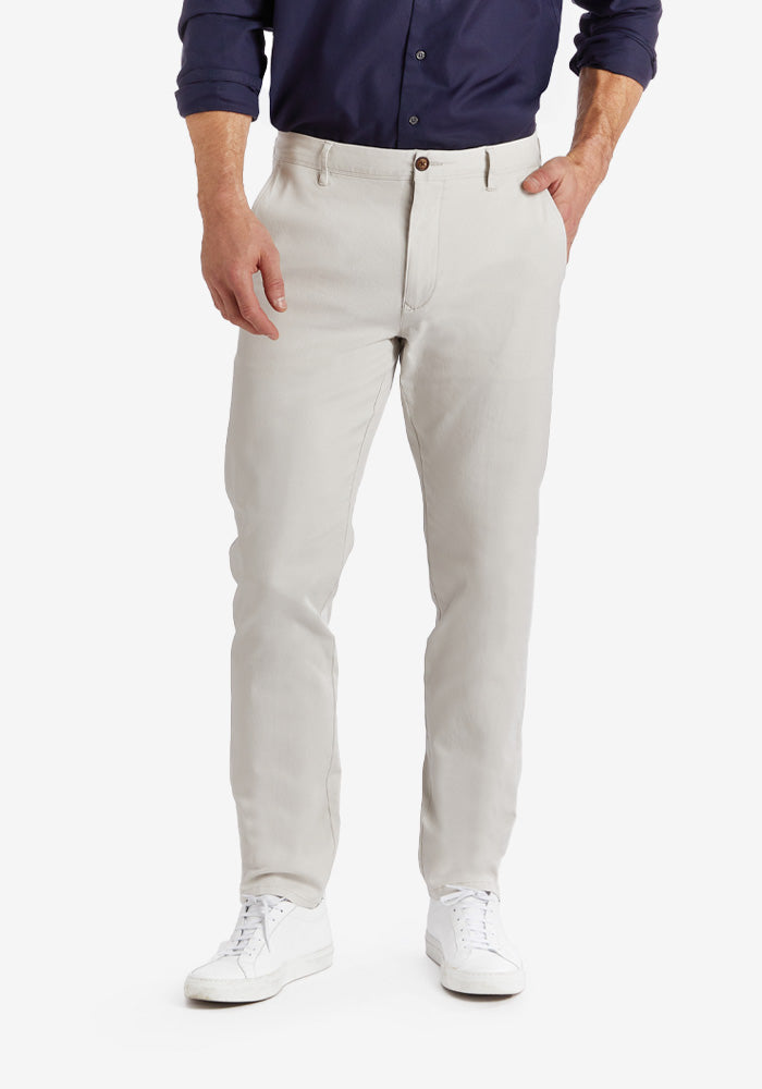  wearing Black Everyday Comfort Chino Slim Pants pants