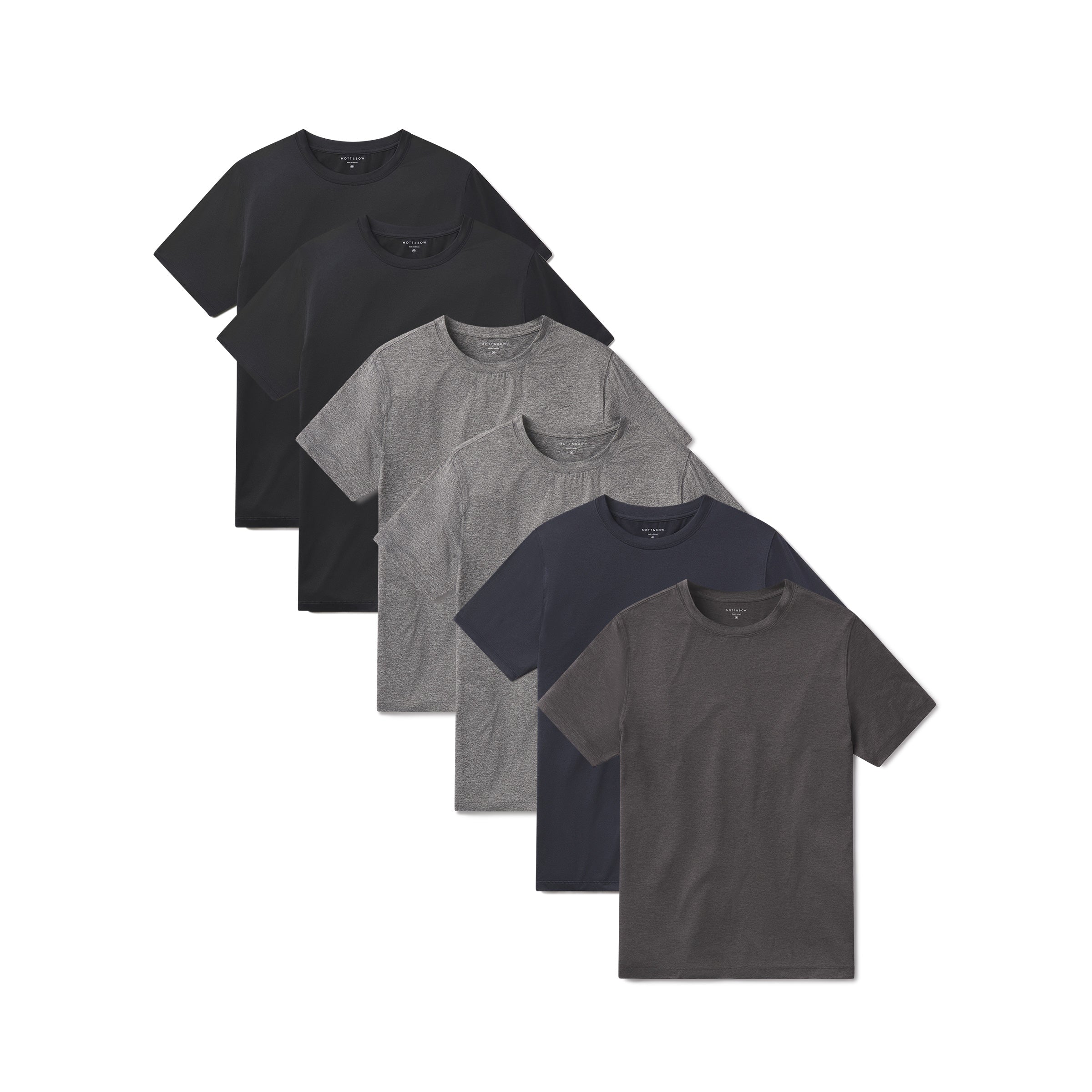  wearing Heather Gray/Heather Gray/Charcoal Heather/Navy Heather/Black Heather/Black Heather Tech Tee 6-Pack tees