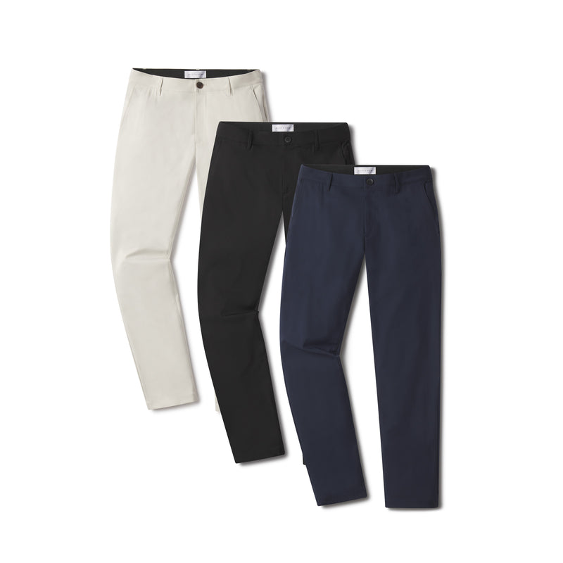  wearing Navy/Black/Stone Slim Tech Pants 3-Pack pants