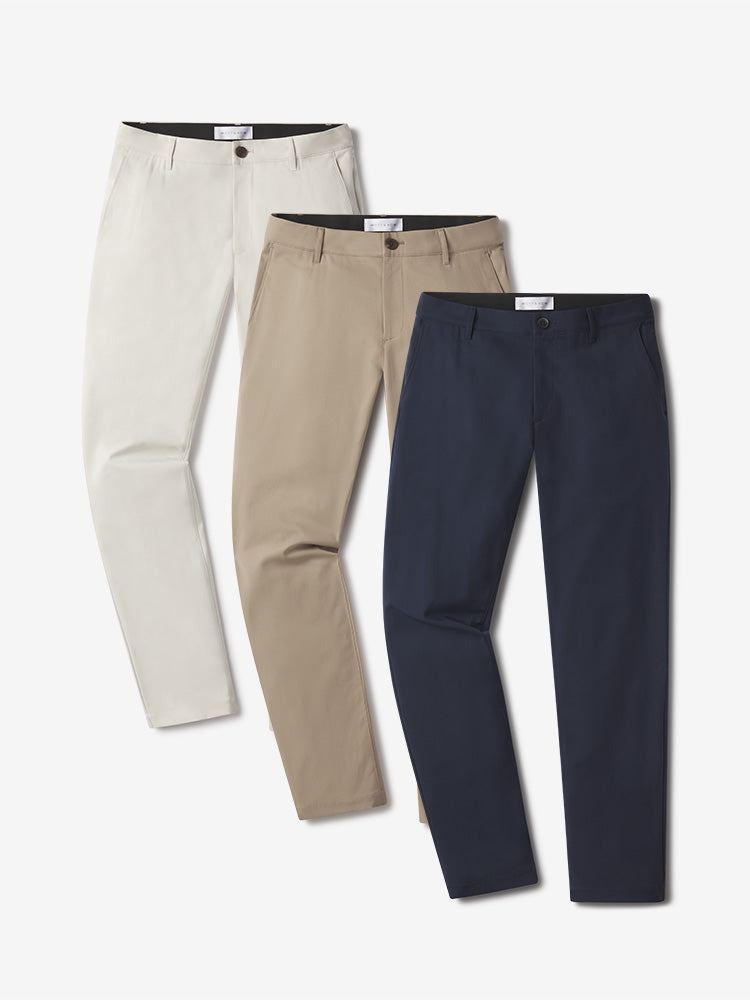  wearing Navy/Stone/Khaki Slim Tech Pants 3-Pack