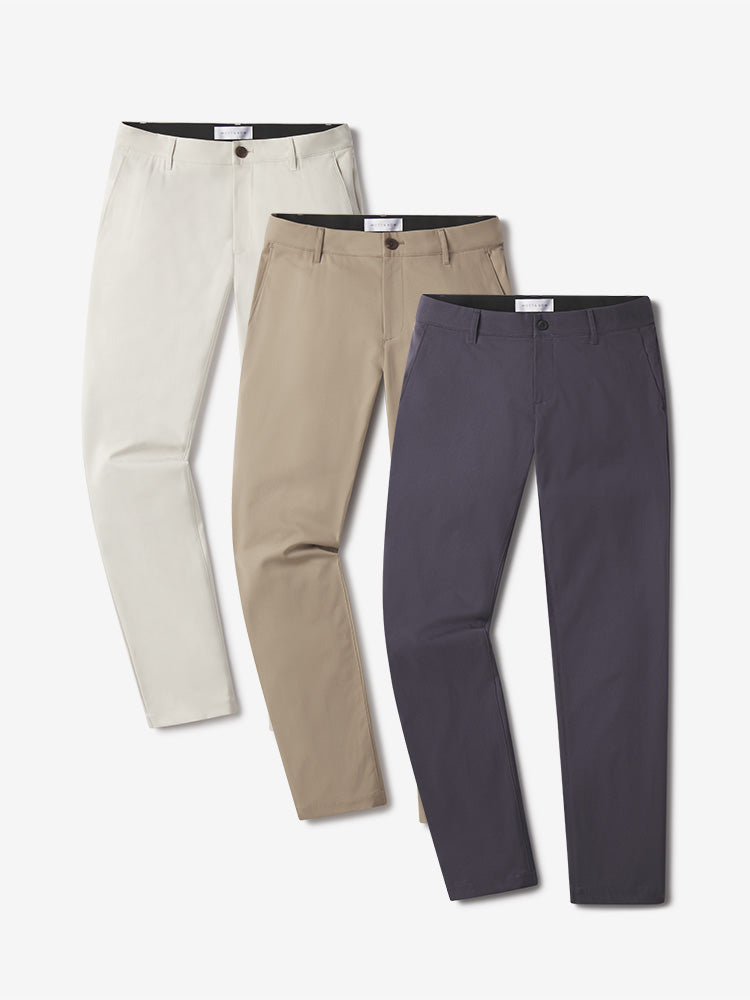  wearing Stone/Khaki/Granite Slim Tech Pants 3-Pack pants