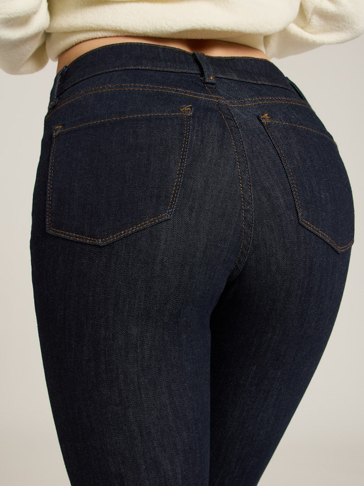 Women wearing Midnight High Rise Skinny Logan Jeans