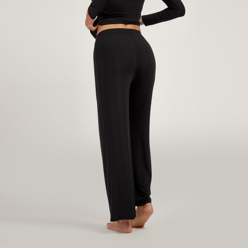 Women wearing Black Lounge Wide Leg Pants - Pre Order lounge
