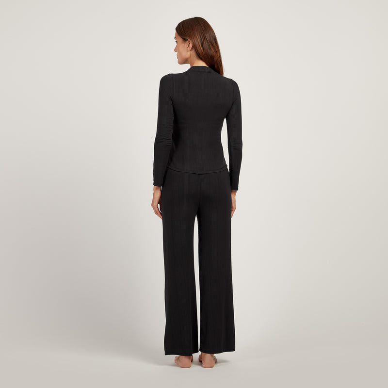 Women wearing Black Lounge Wide Leg Pants - Pre Order lounge