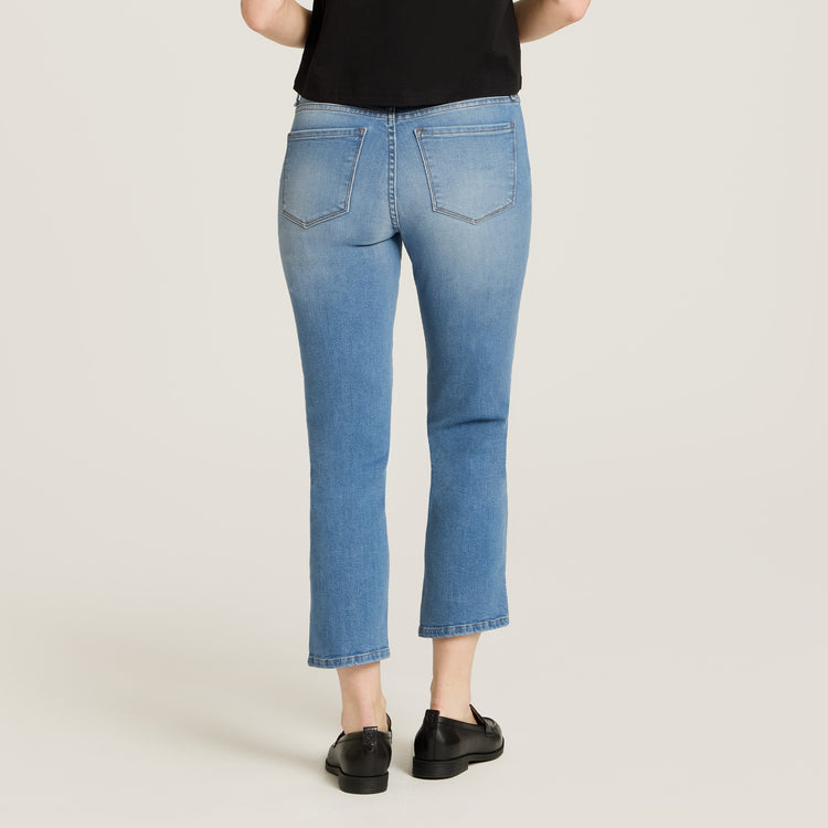 Women wearing Light Blue Mid Rise Slim Cropped Leg Logan Jeans