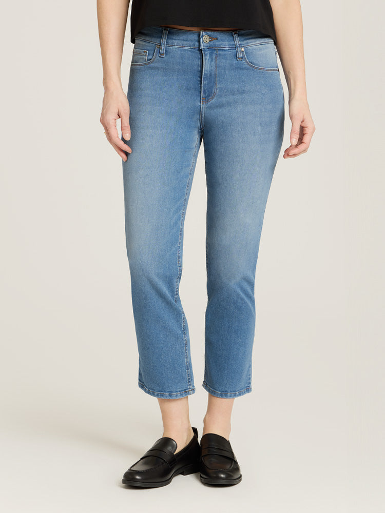 Women wearing Light Blue Mid Rise Slim Cropped Leg Logan Jeans