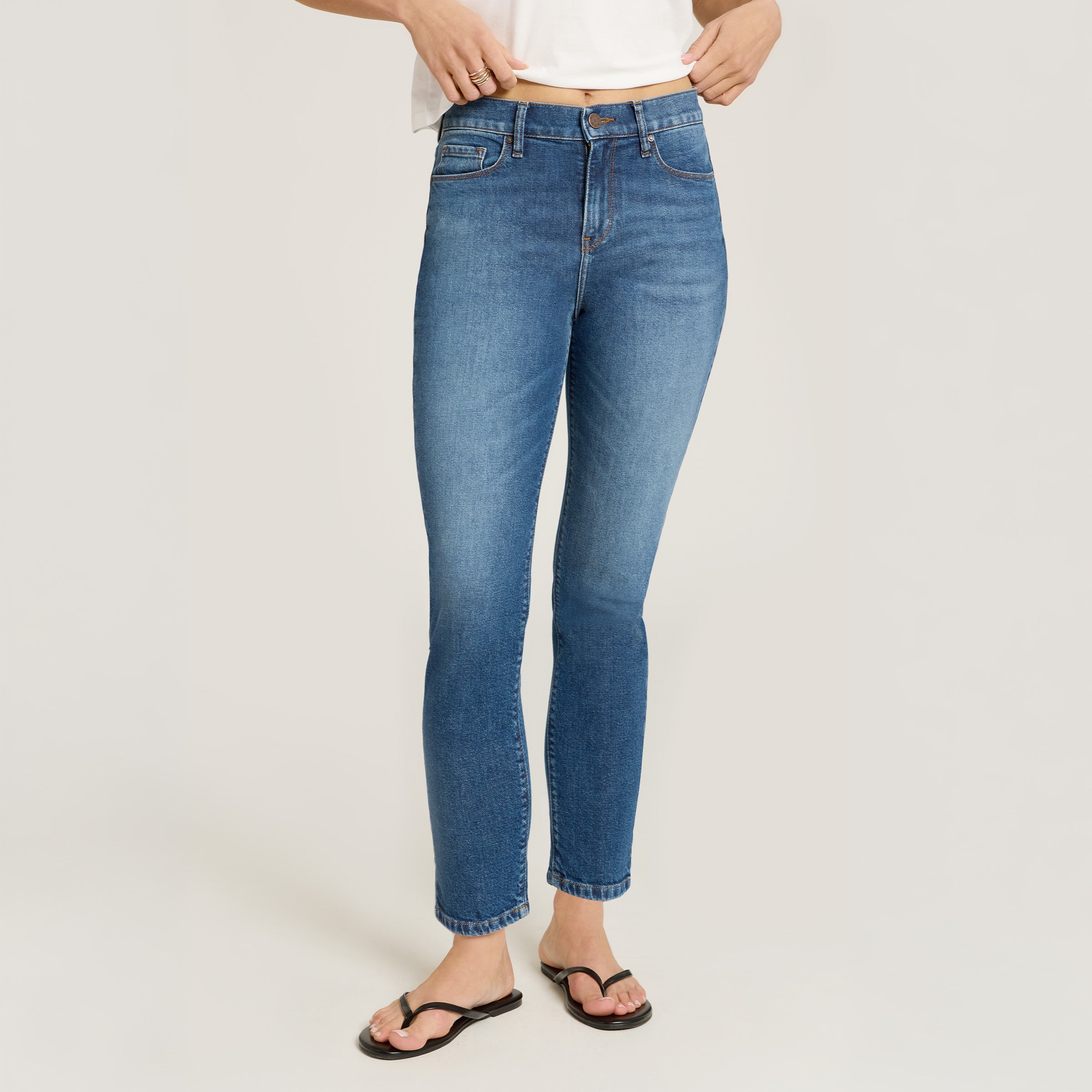 Women wearing Medium Blue High Rise Mom Ridge Jeans