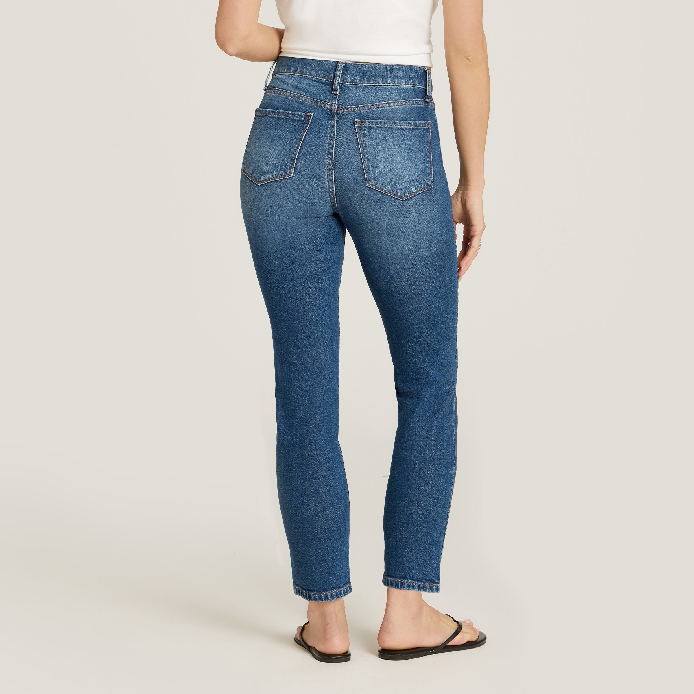 Women wearing Medium Blue High Rise Mom Ridge Jeans