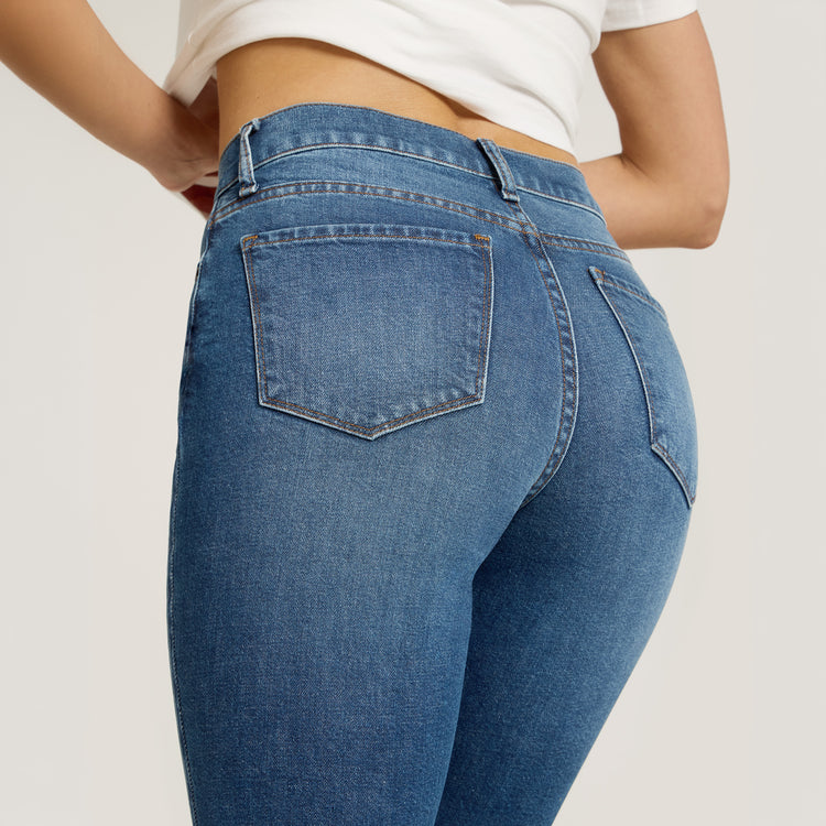 Women wearing Medium Blue High Rise Mom Ridge Jeans