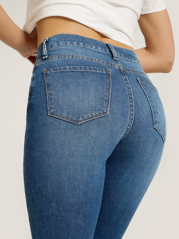 Women wearing Medium Blue High Rise Mom Ridge Jeans