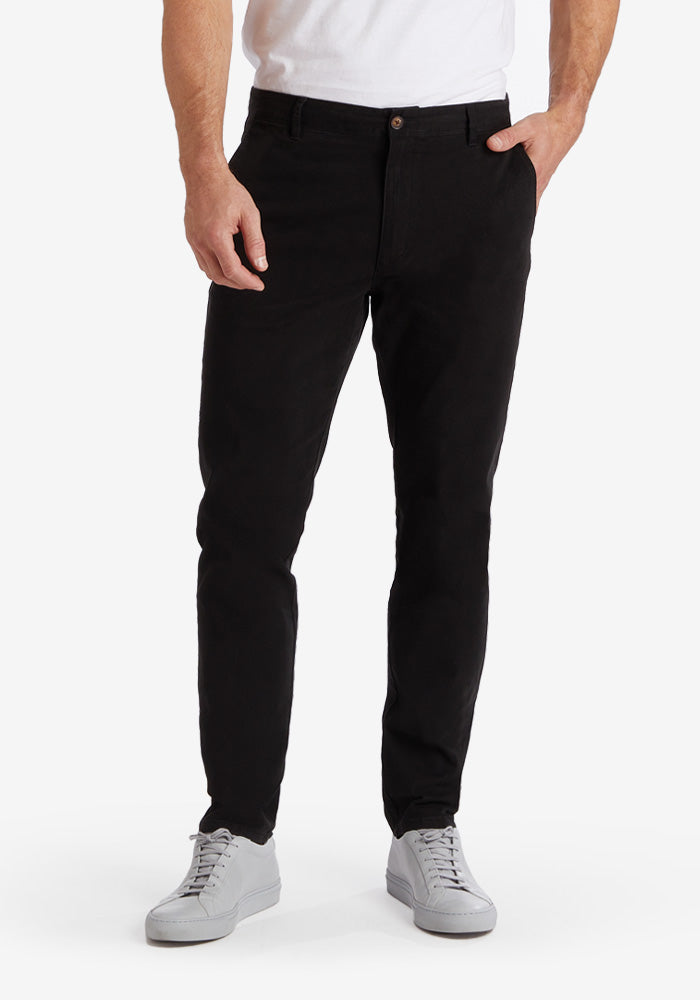  wearing Black Everyday Comfort Chino Slim Pants pants