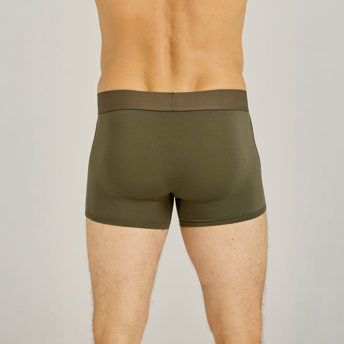 Men wearing Dark Moss Second Skin Trunk