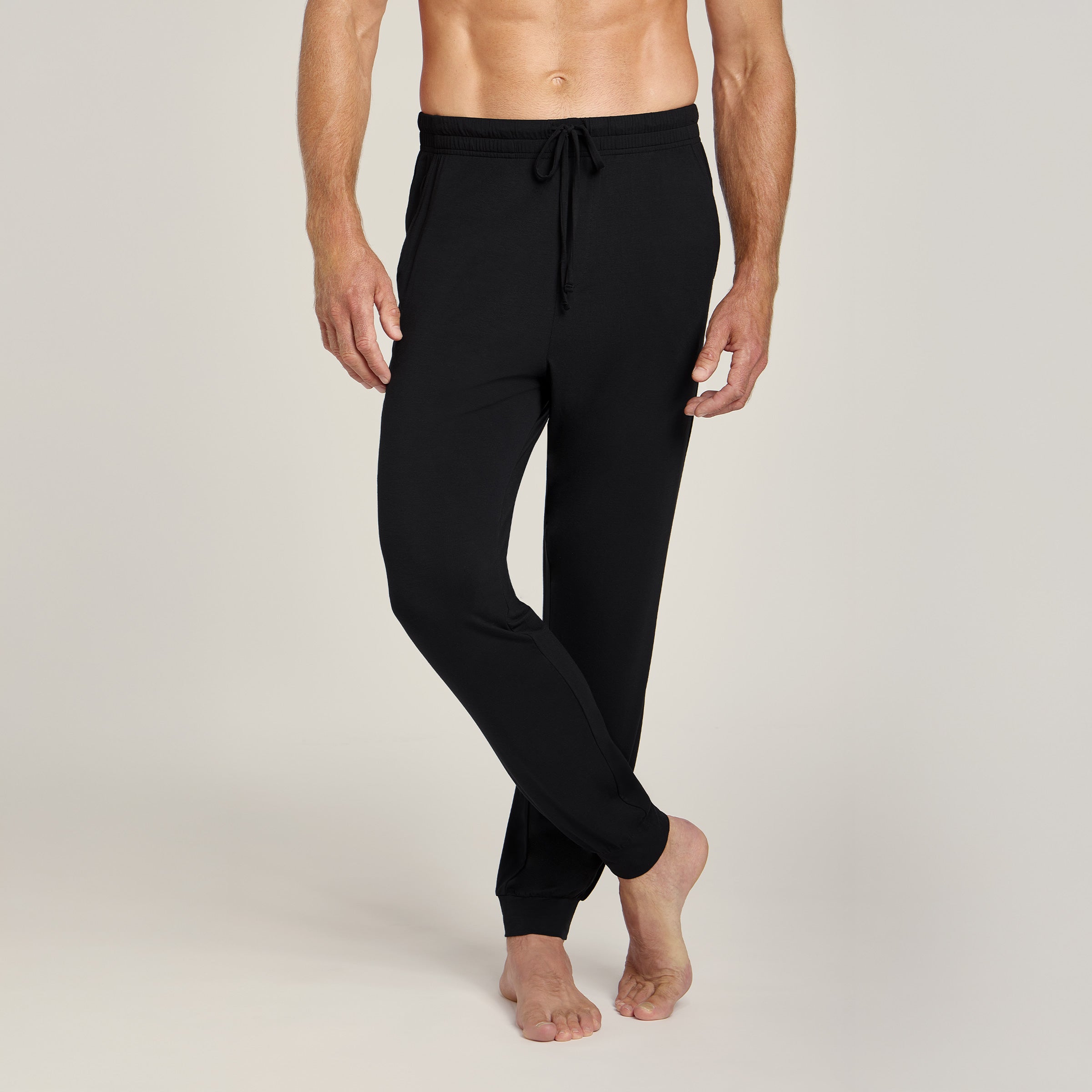 Men wearing Black Unisex Pajama Pants