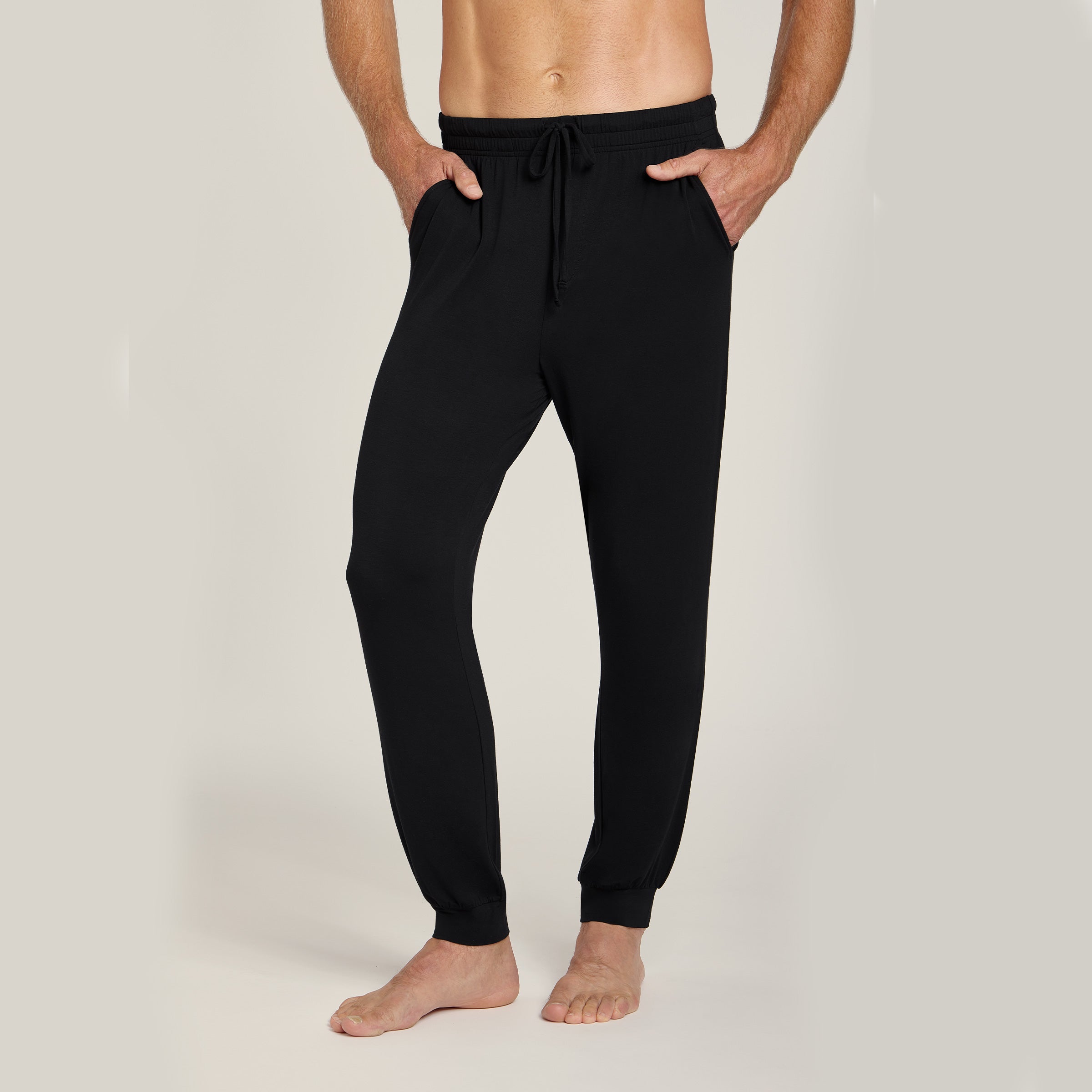 Men wearing Black Unisex Pajama Pants