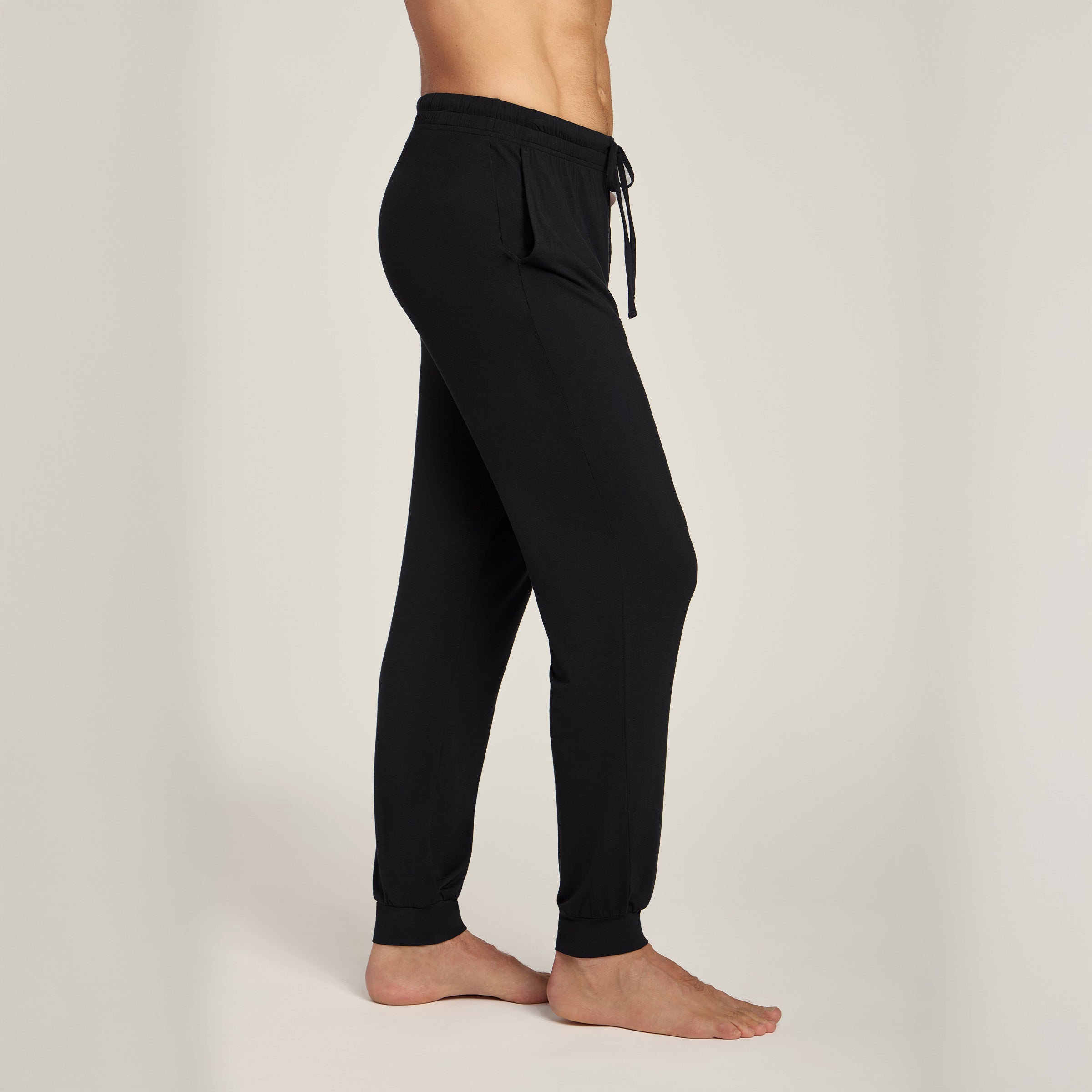 Men wearing Black Unisex Pajama Pants