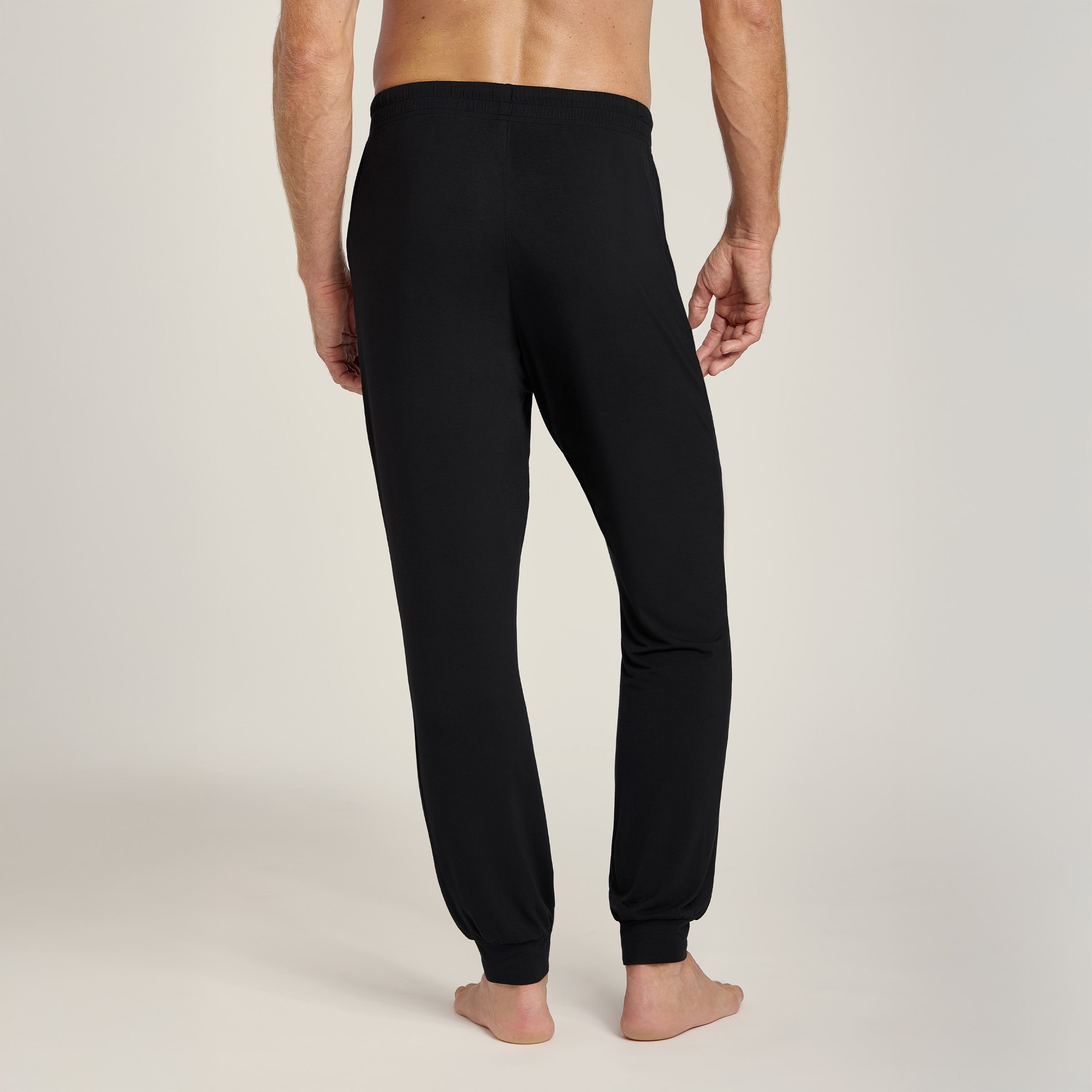 Men wearing Black Unisex Pajama Pants
