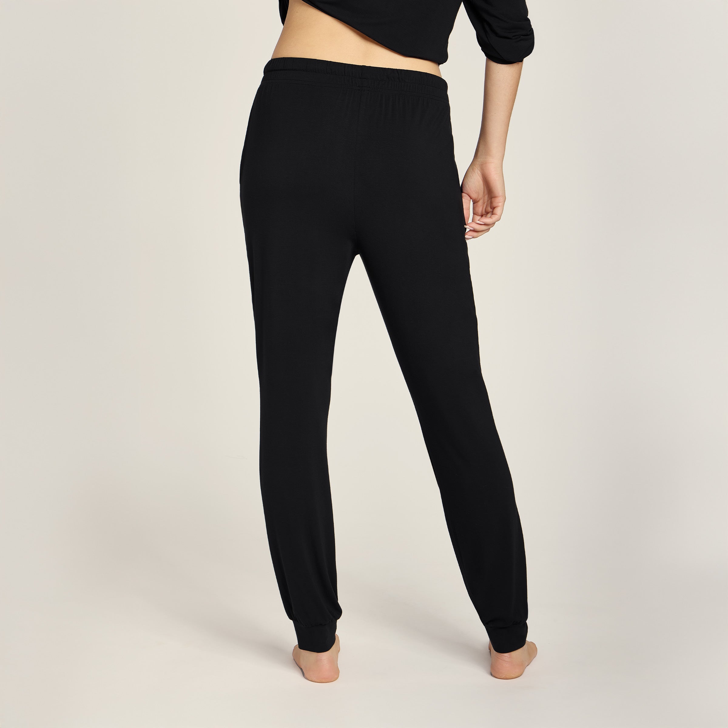 Men wearing Black Unisex Pajama Pants