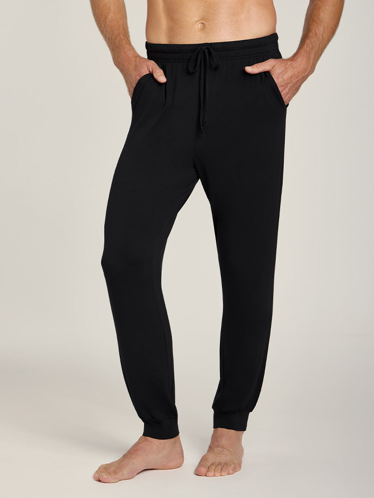 Men wearing Black Unisex Pajama Pants