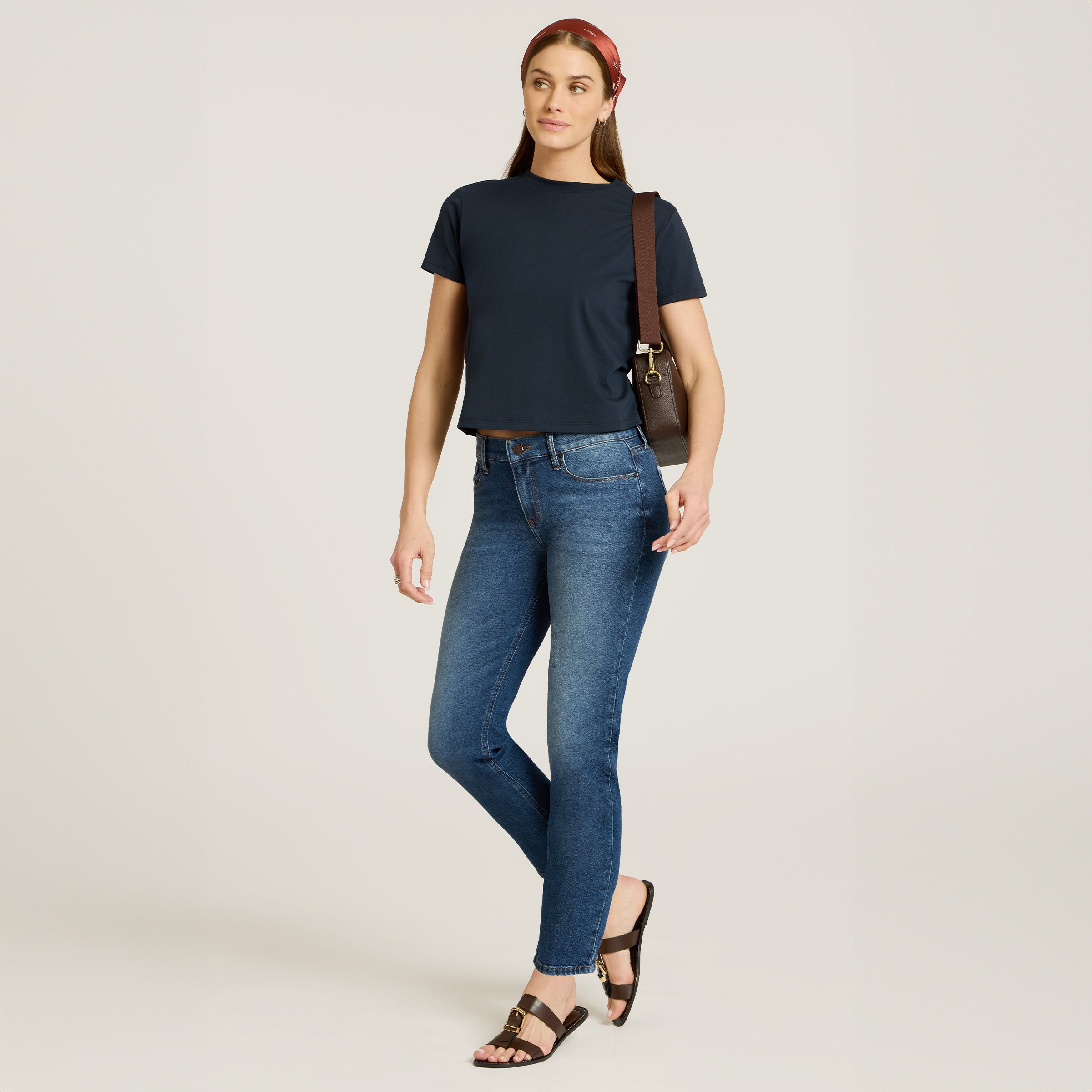 Women wearing Medium Blue Mid Rise Slim Straight Ridge Jeans