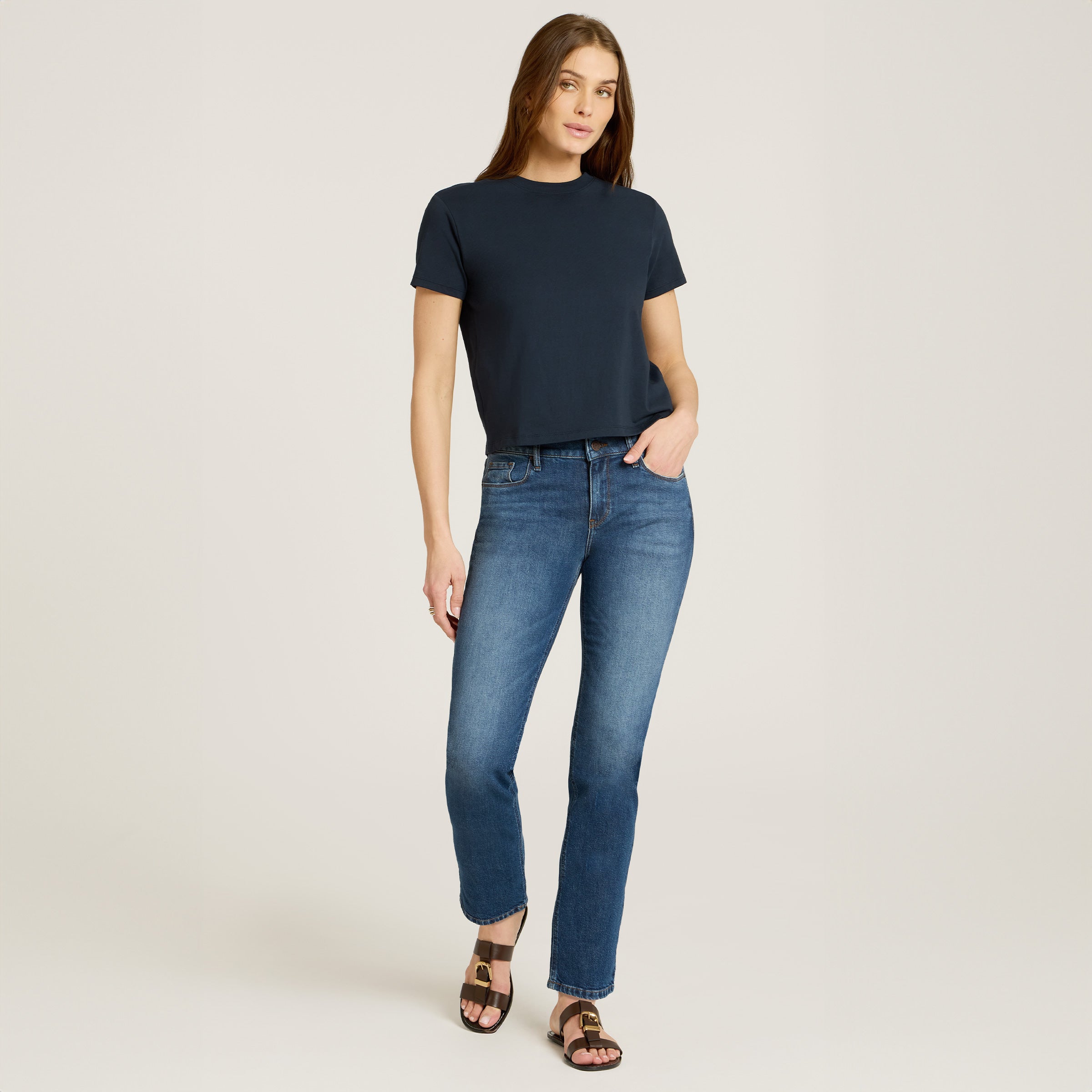 Women wearing Medium Blue Mid Rise Slim Straight Ridge Jeans