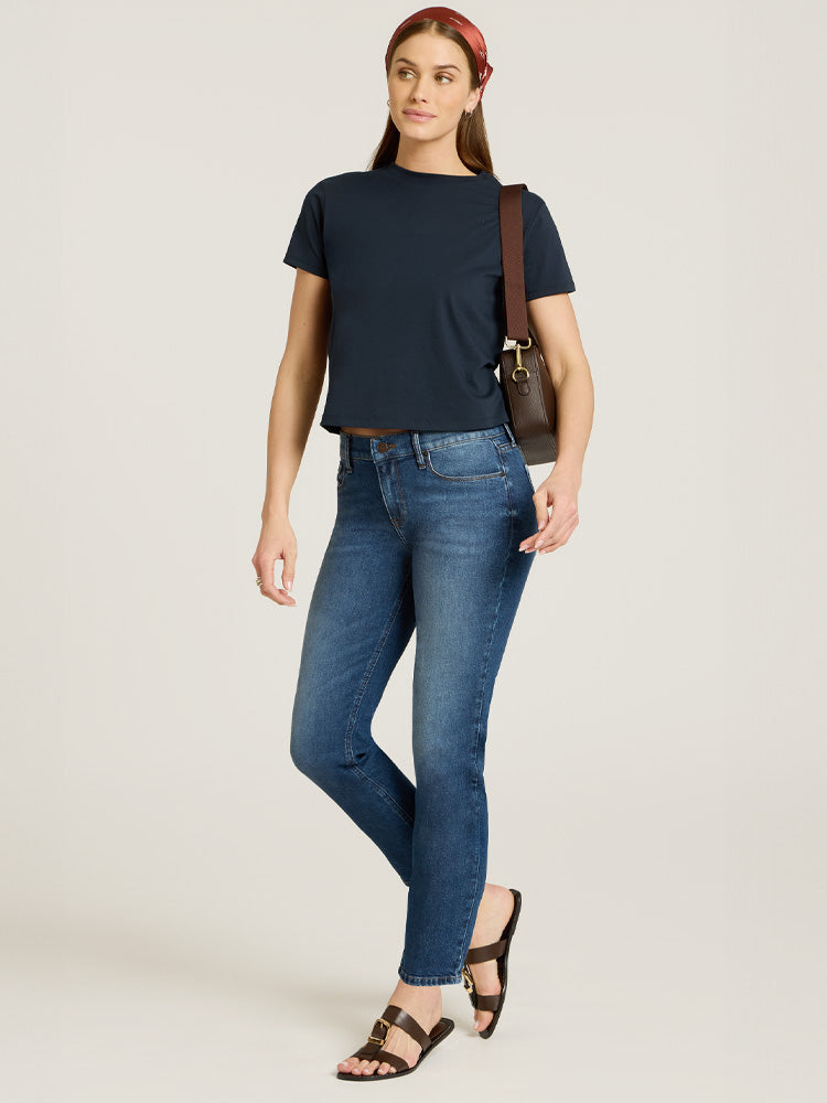 Women wearing Medium Blue Mid Rise Slim Straight Ridge Jeans